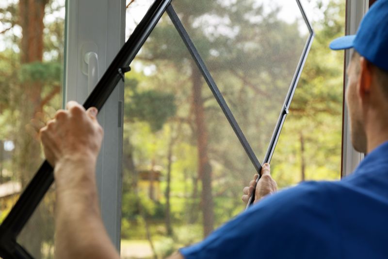Local Garage Screen Installation pros at work